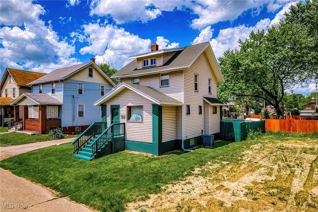 2021 17th St NE, Canton, OH 44705 - american foursquare style home featuring a chimney
