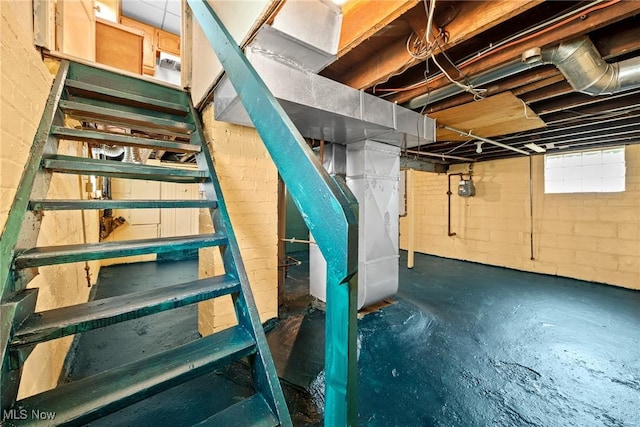 2021 17th St NE, Canton, OH 44705 - unfinished below grade area with gas meter, stairway, and heating unit