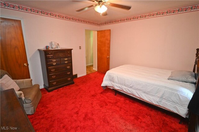 252 Rosemont Ave, Youngstown, OH 44515 - bedroom with carpet, ceiling fan, and baseboards