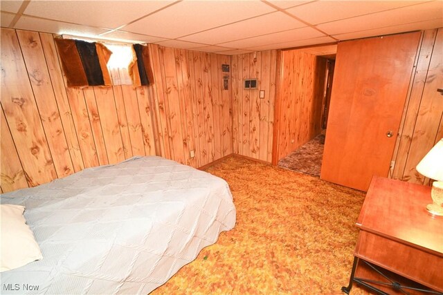 252 Rosemont Ave, Youngstown, OH 44515 - carpeted bedroom featuring a paneled ceiling and wood walls