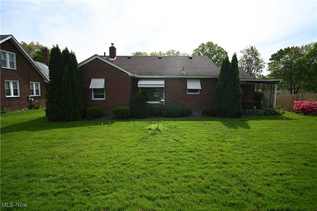 252 Rosemont Ave, Youngstown, OH 44515 - rear view of property featuring brick siding