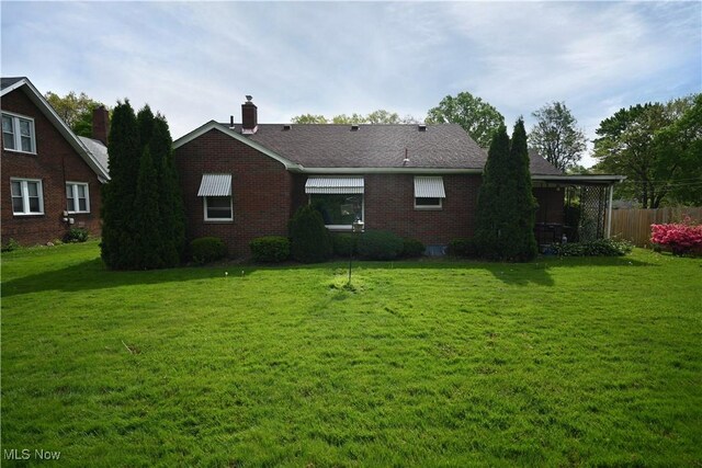 252 Rosemont Ave, Youngstown, OH 44515 - rear view of property with brick siding