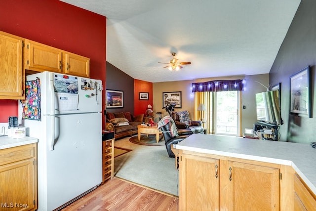 75 River Ridge Lane, Munroe Falls, OH 44262 - kitchen featuring freestanding refrigerator, open floor plan, light wood finished floors, light countertops, and a ceiling fan