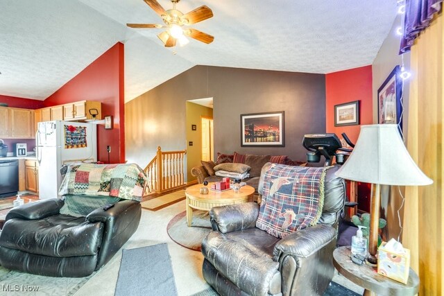 75 River Ridge Lane, Munroe Falls, OH 44262 - living area with vaulted ceiling, a ceiling fan, and a textured ceiling