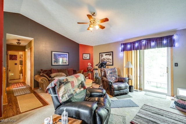 75 River Ridge Lane, Munroe Falls, OH 44262 - living area with carpet flooring, lofted ceiling, and a ceiling fan