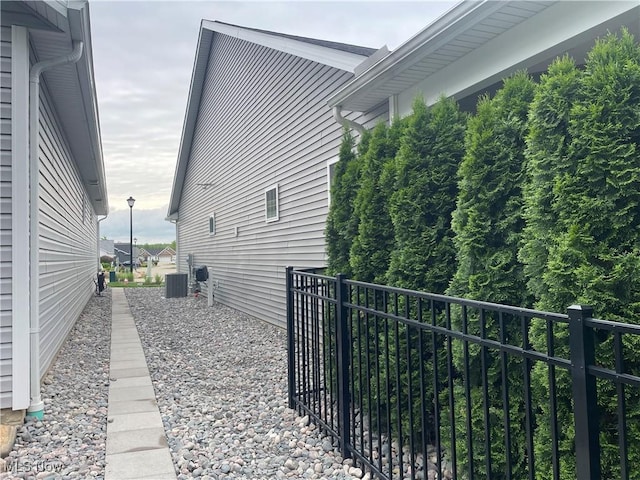 view of property exterior with central air condition unit