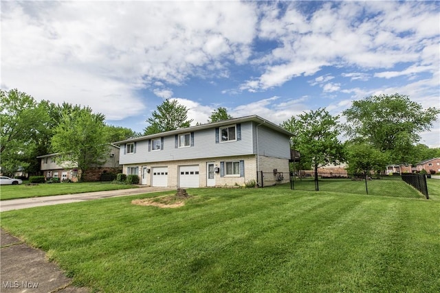 4697-4701 Maple Spur Dr, Stow, OH 44224 - view of front of property featuring a garage, driveway, and brick siding