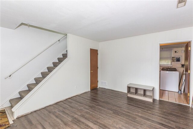4697-4701 Maple Spur Dr, Stow, OH 44224 - unfurnished living room featuring washer / clothes dryer, stairs, and wood finished floors