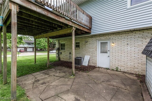 4697-4701 Maple Spur Dr, Stow, OH 44224 - view of patio / terrace featuring central AC unit