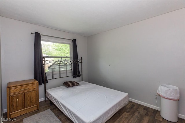 4697-4701 Maple Spur Dr, Stow, OH 44224 - bedroom featuring dark wood finished floors and baseboards