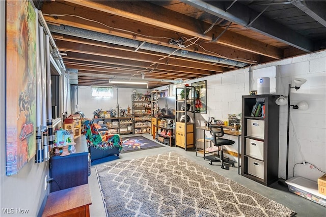 basement with a desk
