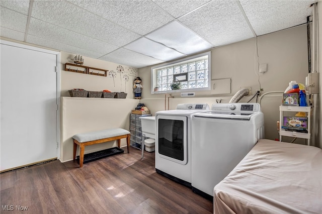 3226 Woodlawn Dr, Parma, OH 44134 - laundry area with separate washer and dryer and dark wood-style flooring