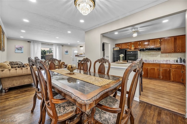 3226 Woodlawn Dr, Parma, OH 44134 - dining area featuring ornamental molding, recessed lighting, dark wood-style floors, a chandelier, and ceiling fan