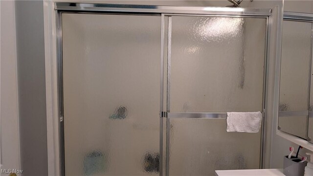 33-37 Alaska Ave, Chester, WV 26034 - full bath featuring an enclosed shower