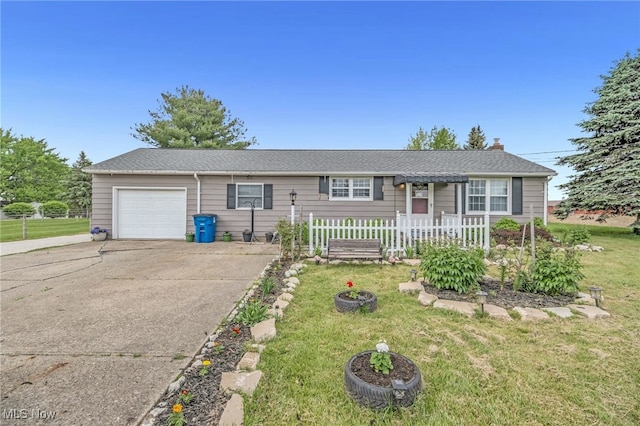 6395 Easton St NE, Louisville, OH 44641 - ranch-style home featuring an attached garage and driveway