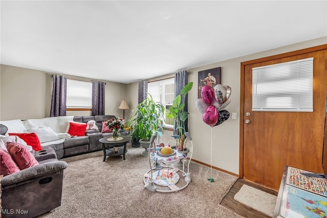 6395 Easton St NE, Louisville, OH 44641 - living room featuring baseboards