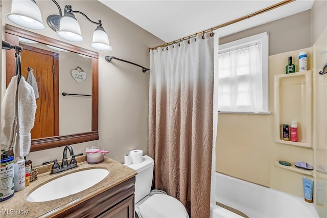 6395 Easton St NE, Louisville, OH 44641 - bathroom featuring toilet, shower / bath combination with curtain, and vanity