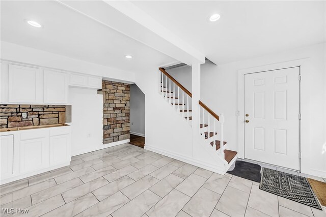 6395 Easton St NE, Louisville, OH 44641 - foyer entrance featuring stairway and recessed lighting