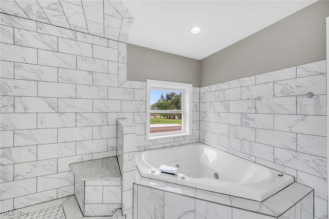 6395 Easton St NE, Louisville, OH 44641 - full bathroom featuring a tub with jets and tile walls