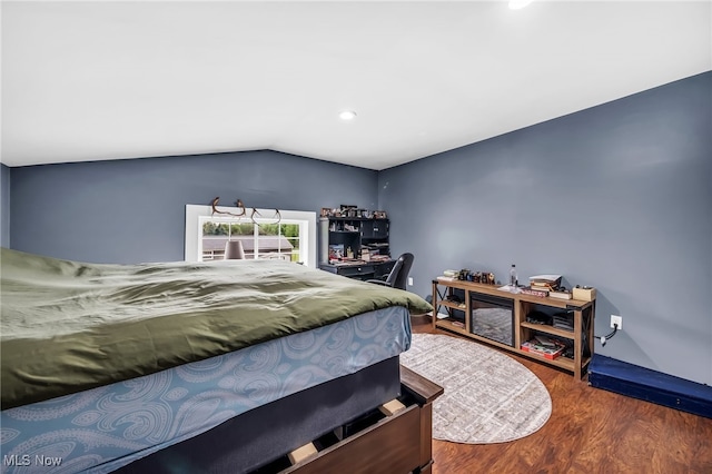 6395 Easton St NE, Louisville, OH 44641 - bedroom featuring wood finished floors, recessed lighting, and lofted ceiling
