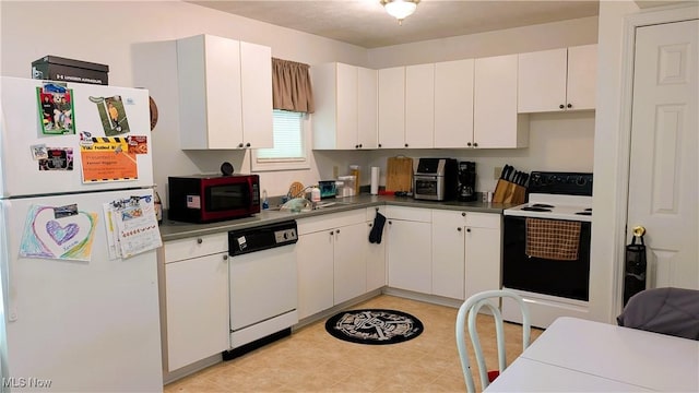 33-37 Alaska Ave, Chester, WV 26034 - kitchen featuring white appliances, a sink, white cabinets, and dark countertops