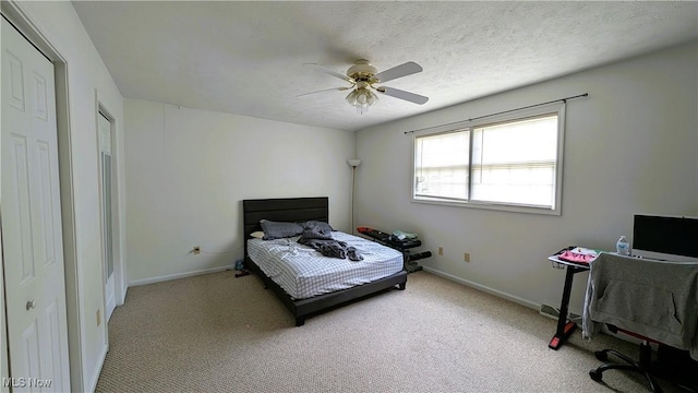 33-37 Alaska Ave, Chester, WV 26034 - carpeted bedroom with baseboards and ceiling fan
