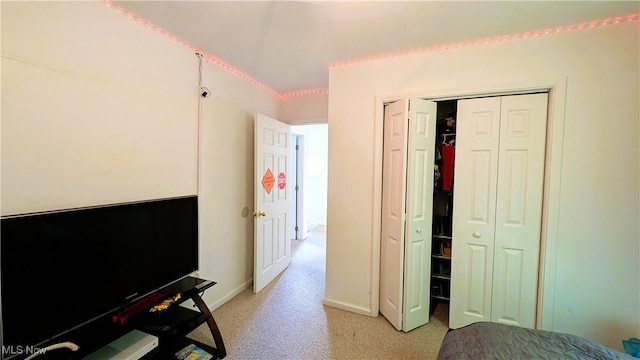 33-37 Alaska Ave, Chester, WV 26034 - bedroom featuring light carpet, a closet, and baseboards