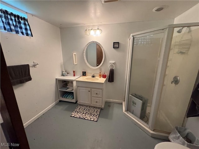 61272 Salem Rd, Salesville, OH 43778 - full bath with concrete flooring, a stall shower, baseboards, and vanity