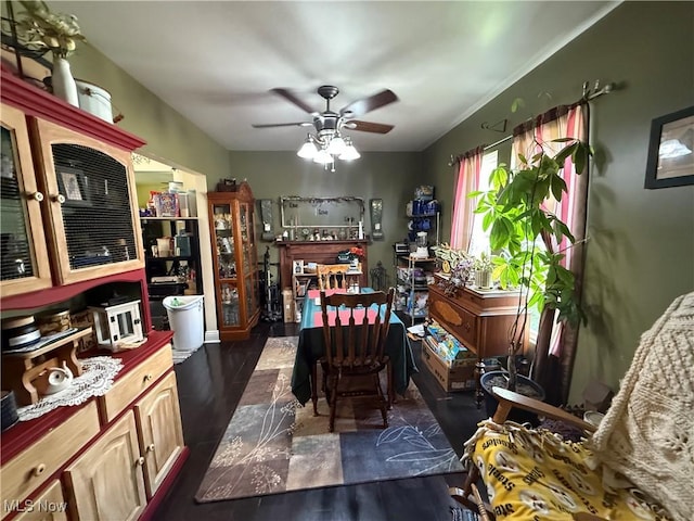1710 Clairmont Ave, Cambridge, OH 43725 - dining room featuring a ceiling fan and dark wood-style flooring