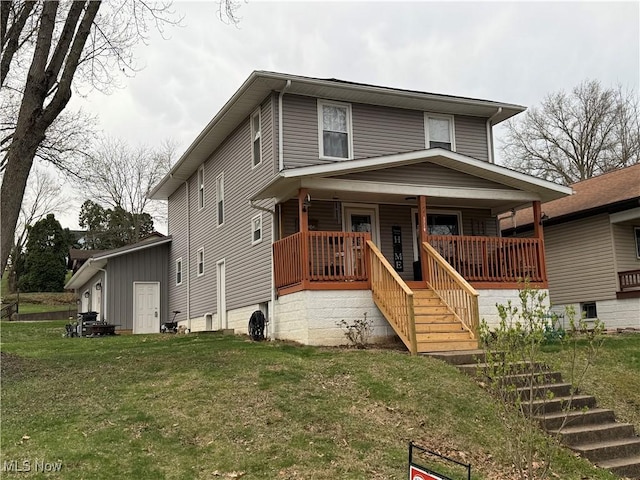 1710 Clairmont Ave, Cambridge, OH 43725 - traditional style home featuring covered porch, stairs, and a front yard