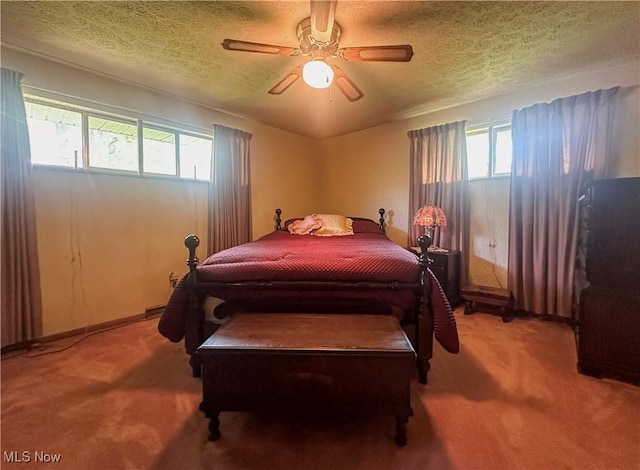1010 Park Cir, Girard, OH 44420 - carpeted bedroom featuring a textured ceiling and a ceiling fan