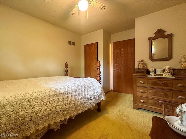 1010 Park Cir, Girard, OH 44420 - bedroom with light carpet and ceiling fan