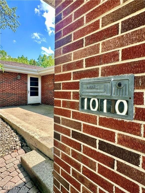 1010 Park Cir, Girard, OH 44420 - exterior view of brick siding