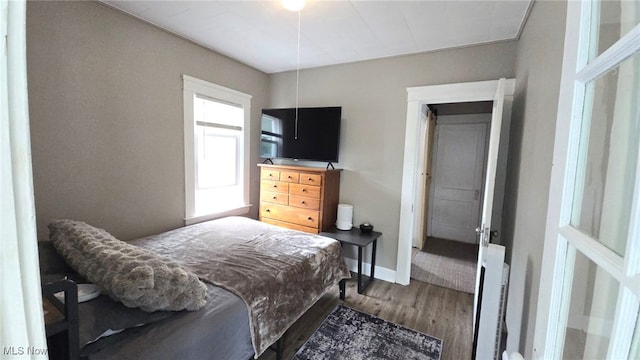 1300 Ethel Ave, Lakewood, OH 44107 - bedroom featuring wood finished floors and baseboards