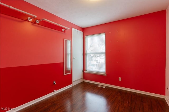 3602 Marvin Ave, Cleveland, OH 44109 - unfurnished room featuring wood finished floors and baseboards