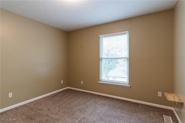 3602 Marvin Ave, Cleveland, OH 44109 - unfurnished room featuring carpet flooring and baseboards