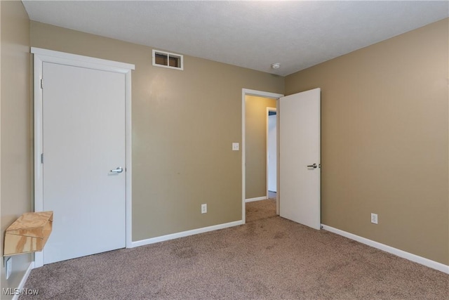 3602 Marvin Ave, Cleveland, OH 44109 - unfurnished bedroom with carpet floors and baseboards