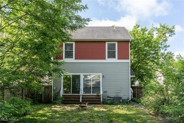 3602 Marvin Ave, Cleveland, OH 44109 - rear view of property with roof with shingles and central AC