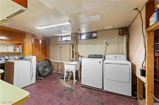 79 Leighton Ave, Youngstown, OH 44512 - clothes washing area with washer and clothes dryer and cabinet space