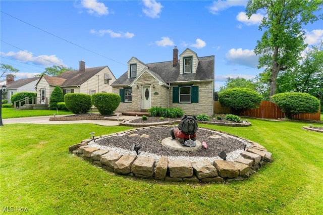 79 Leighton Ave, Youngstown, OH 44512 - cape cod home featuring stone siding and a chimney
