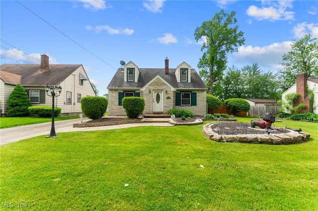 79 Leighton Ave, Youngstown, OH 44512 - cape cod house with stone siding and a chimney