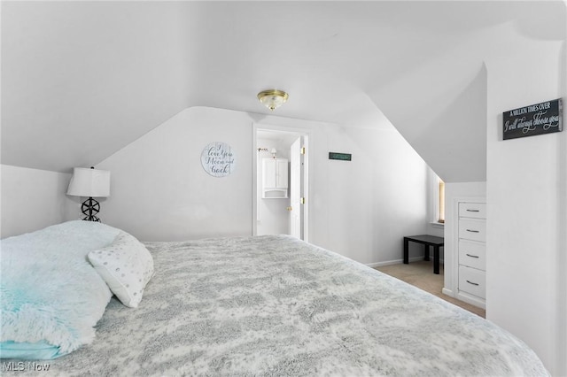 79 Leighton Ave, Youngstown, OH 44512 - carpeted bedroom featuring vaulted ceiling and baseboards