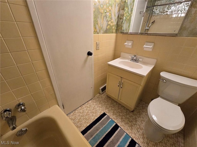 16100 Van Aken Blvd, Shaker Heights, OH 44120 - bathroom with tile walls, toilet, vanity, and tile patterned flooring
