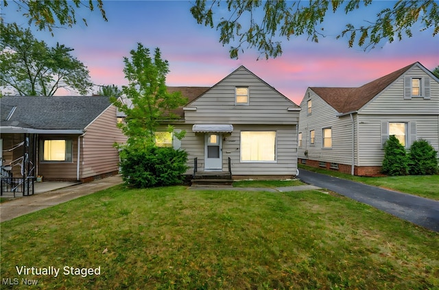 21407 Libby Rd, Maple Heights, OH 44137 - view of front of house featuring a front lawn