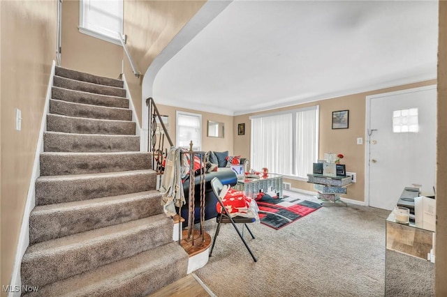 21407 Libby Rd, Maple Heights, OH 44137 - carpeted living room with stairs and baseboards