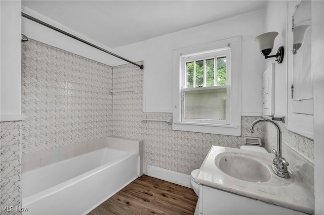 955 Dresden Rd, Cleveland Heights, OH 44112 - full bathroom with vanity, wood finished floors, tub / shower combination, toilet, and wainscoting