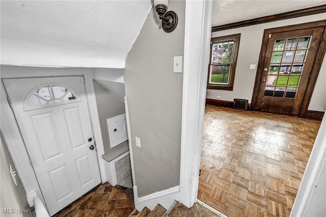 955 Dresden Rd, Cleveland Heights, OH 44112 - entrance foyer with a textured ceiling and baseboards
