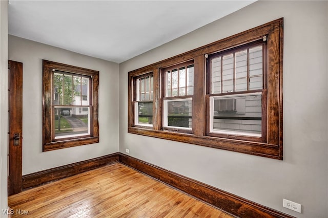 955 Dresden Rd, Cleveland Heights, OH 44112 - unfurnished room with baseboards and wood finished floors