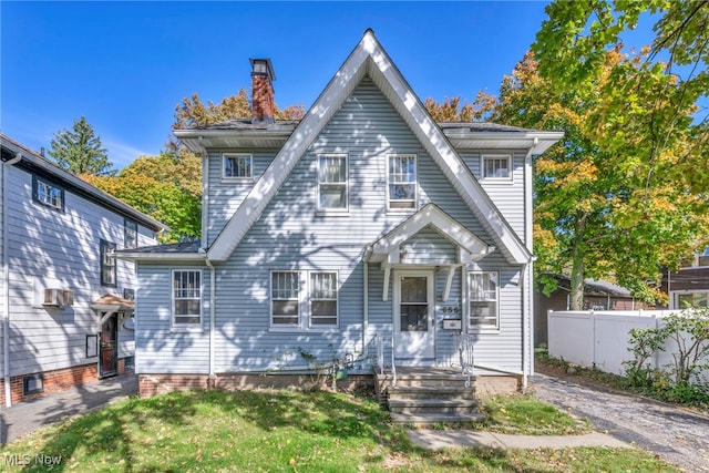 955 Dresden Rd, Cleveland Heights, OH 44112 - view of front of home with a chimney and fence
