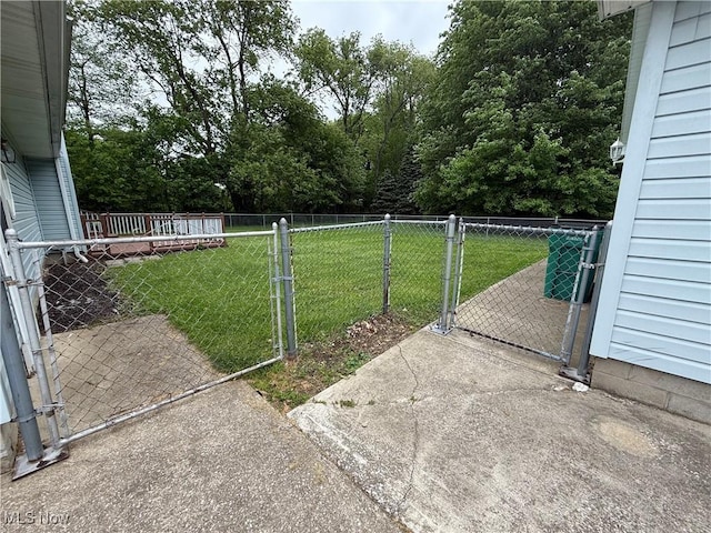 view of yard featuring a gate